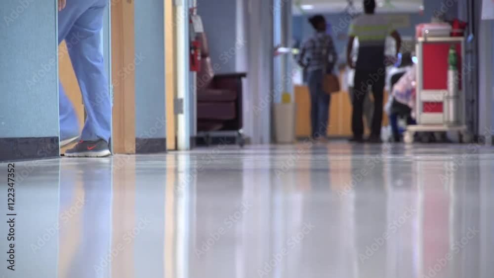 Visitors and medical professionals in a medical wing Visitors and medical professionals in a medical wing
