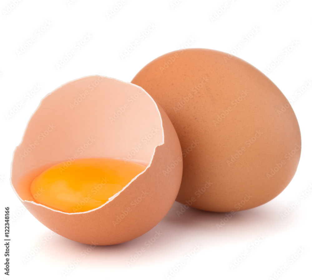 Broken egg in eggshell half and raw egg isolated on white backgr Broken egg in eggshell half and raw egg isolated on white backgr