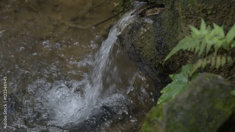 SAO PAULO, SP, BRAZIL - FEBRUARY 6, 2016 - Natural pure water from the forest that feed the cities reservoirs SAO PAULO, SP, BRAZIL - FEBRUARY 6, 2016 - Natural pure water from the forest that feed the cities reservoirs