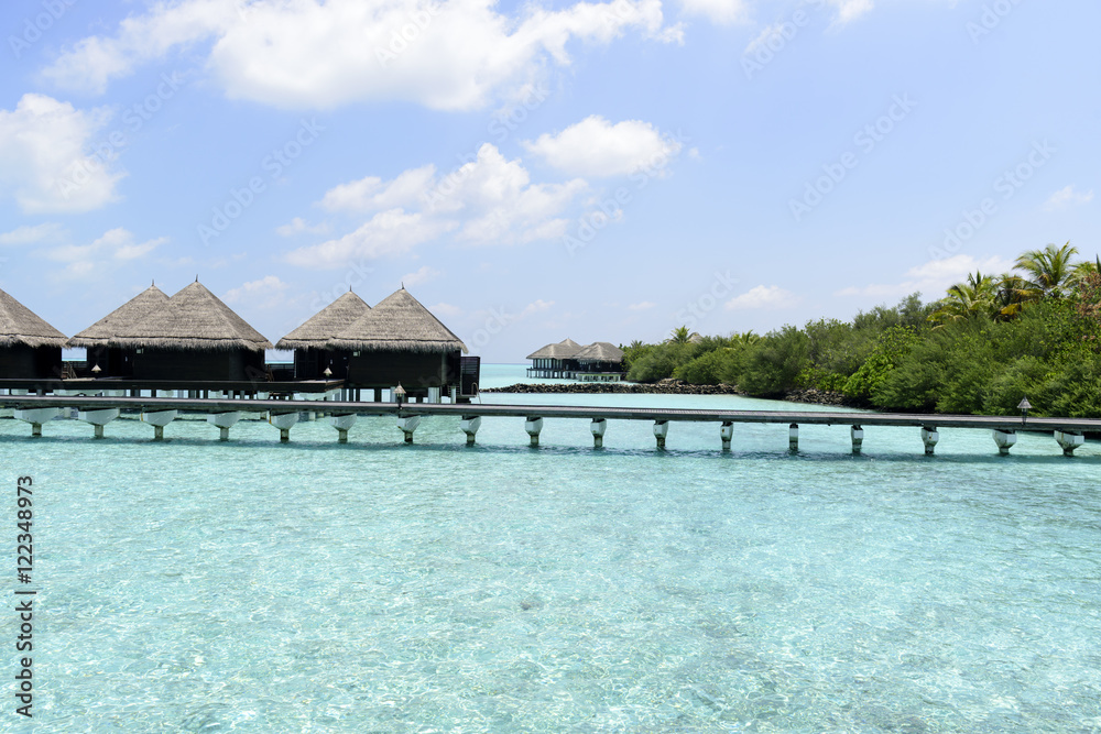houses on piles on sea. Maldives