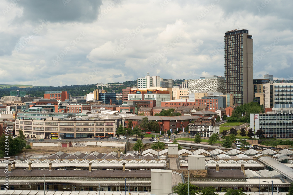 Cityscape of Sheffield with train station in foreground