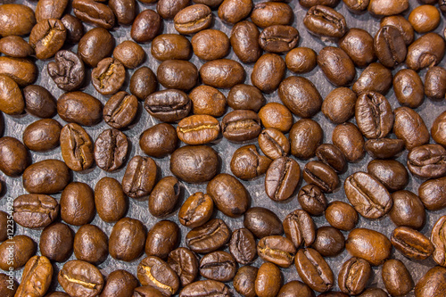 Coffee beans on black stone table