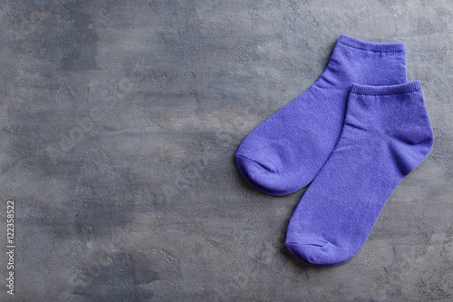 Blue socks on a grey table