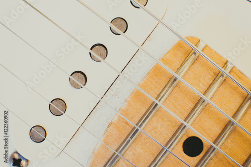 Electric guitar pick up detail, music symbol