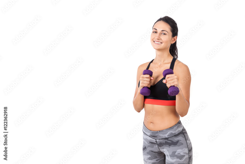 Fitness coach holding dumbbells in folded hands. Fitness coach holding dumbbells in folded hands.