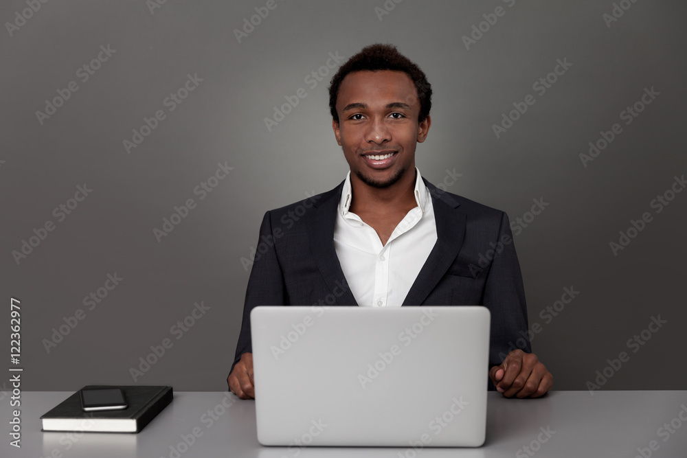 Content African clerk at workplace Content African clerk at workplace