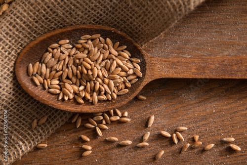 spelled grain on the wood table