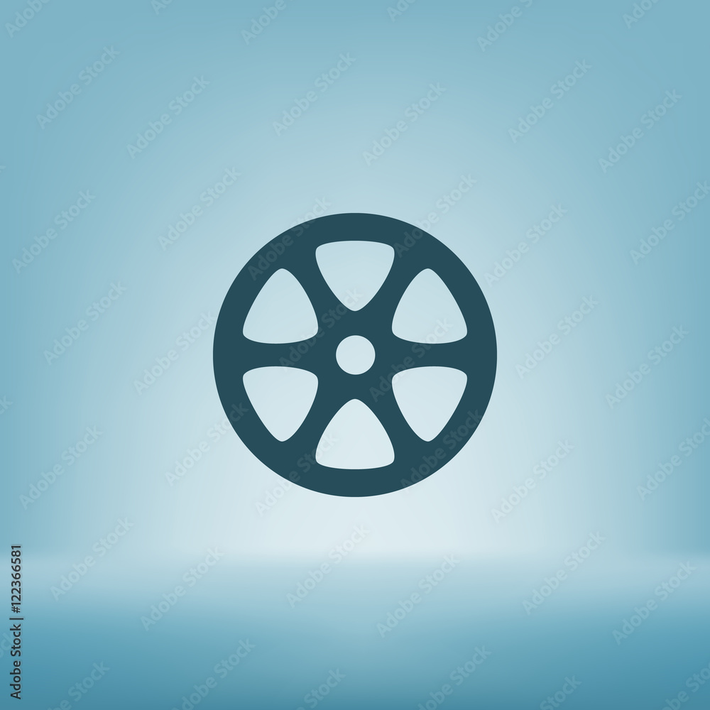 Flat paper cut style icon of old tape spool