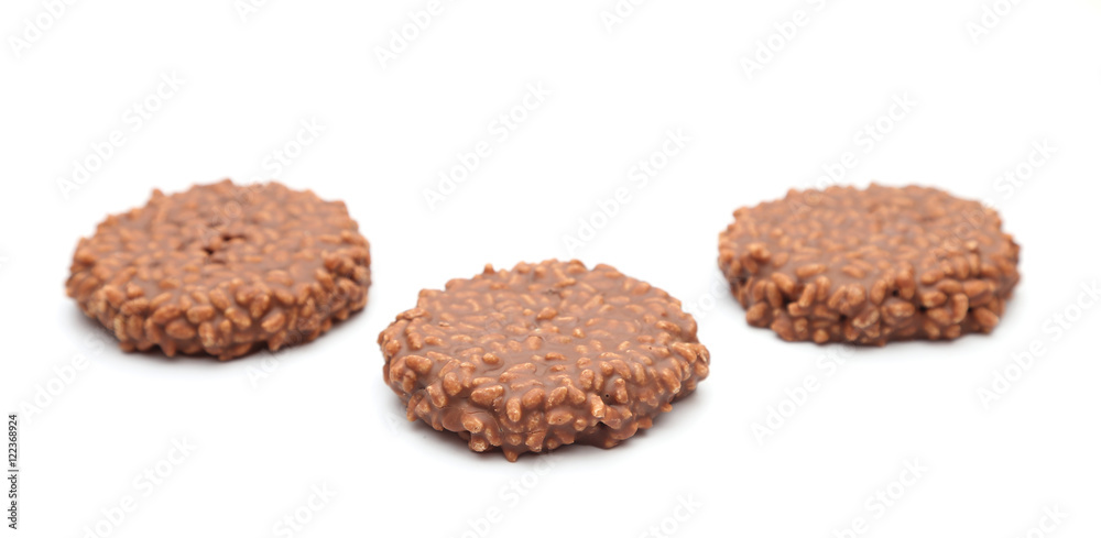 Chocolate Crisp Rice and Caramel Cake on a White Background