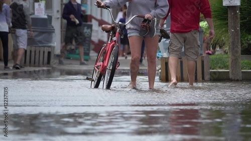 People being evacuated from flood