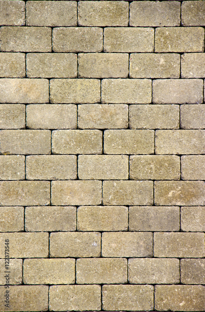 Fototapeta premium Orange Concrete pavers pattern for advertising close-up