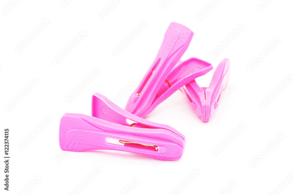 plastic clothespins on white background