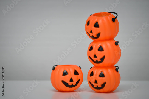 Halloween pumpkins plastic for putting candy © magneticmcc