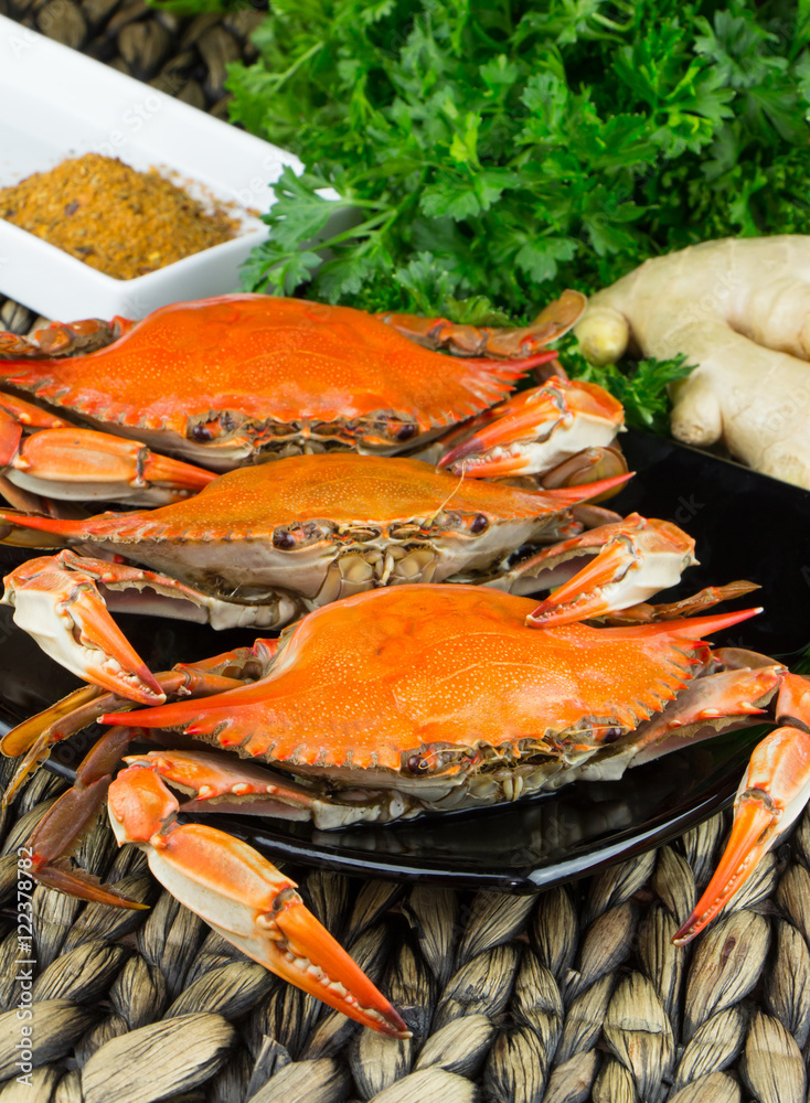 Steamed crabs with spices. Maryland blue crabs. Hot steamed blue crabs with ginger. Crab