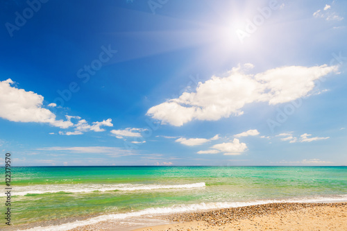 Beautiful beach and blue sky with clouds. photo