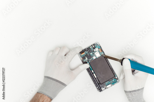 Mobile phone repairing process, flat lay, top view