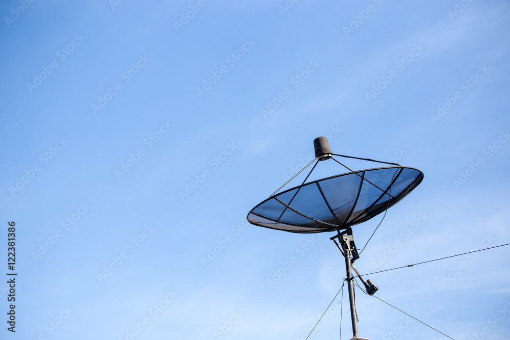 Black antenna on a sunny day with blue sky Black antenna on a sunny day with blue sky