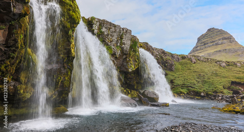 Kirkjufellsfoss waterfall near the Kirkjufell mountain