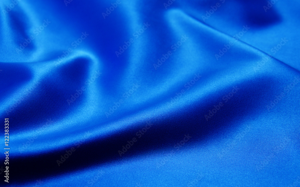 Fototapeta premium Smooth elegant blue silk can use as background