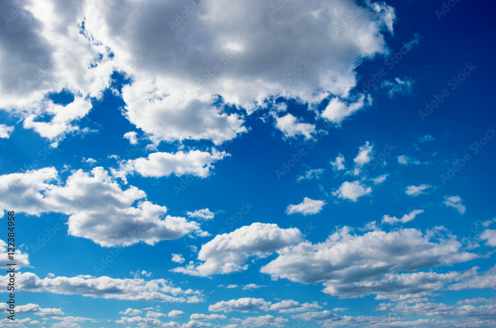 White clouds in blue sky.