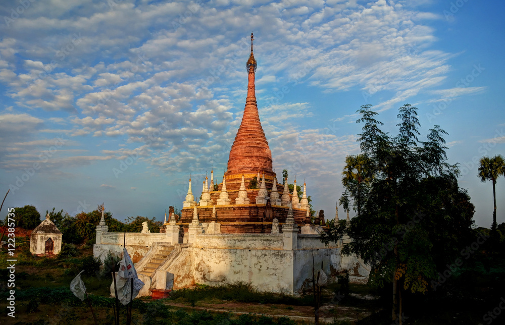Fototapeta premium Stupa near Maha Aungmye Bonzan temple at sunset, Ava, Myanmar