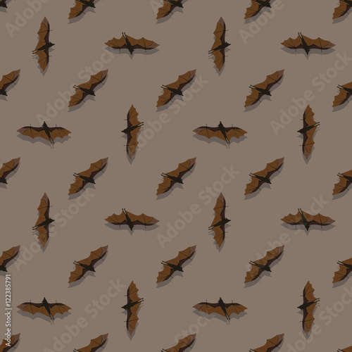 Seamless pattern with bats on brown background © Traida