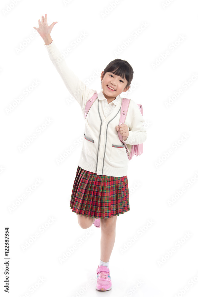 Asian child in school uniform with pink school bag Asian child in school uniform with pink school bag