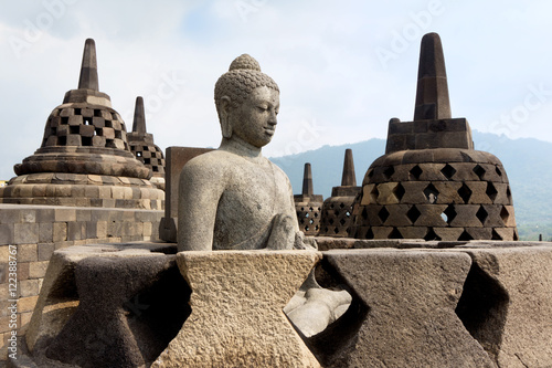The Buddha statue at  Borobudur temple, Magelang Regency, near Yogyakarta, Java Island, Indonesia