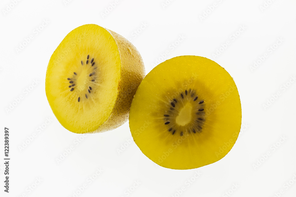 Kiwi slices into half on white background Kiwi slices into half on white background