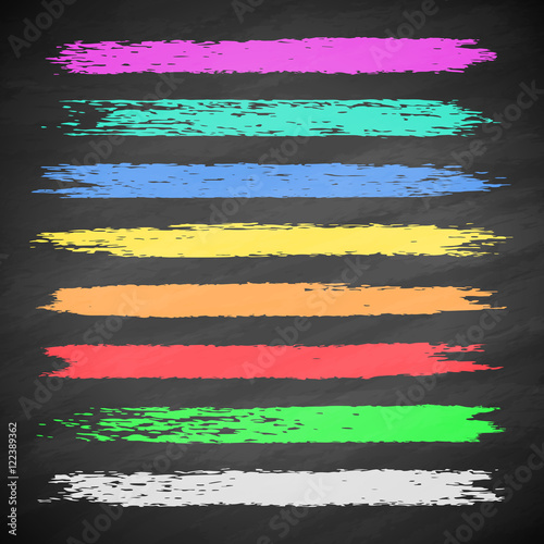Grunge colorful chalk stripes on blackboard