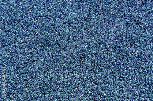 Decorative blue grass loan texture. Sport and leisure.