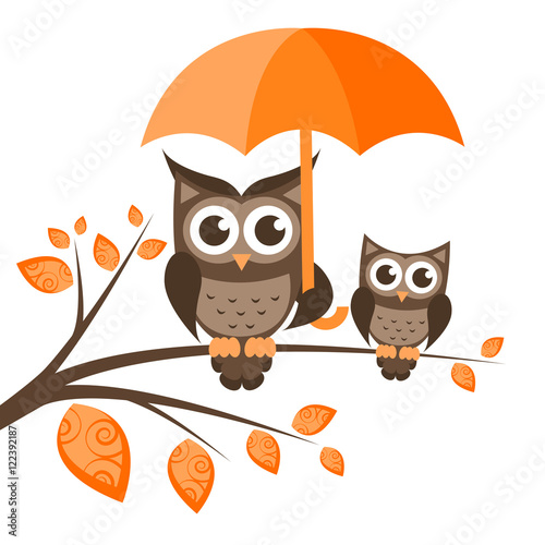 Two owls on the tree with umbrella
