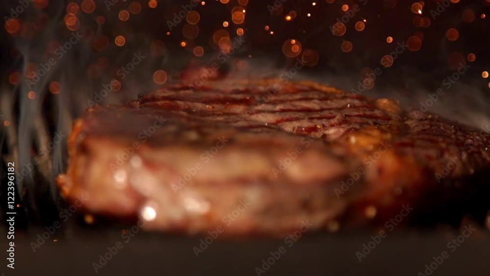 Cooking stake in slow motion