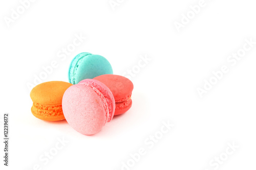 sweet macaroons on white background in soft focus with copy space photo