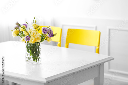 Bouquet of fresh eustoma flowers on table