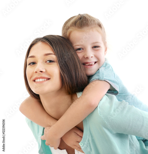 Cute girl with mother on white background