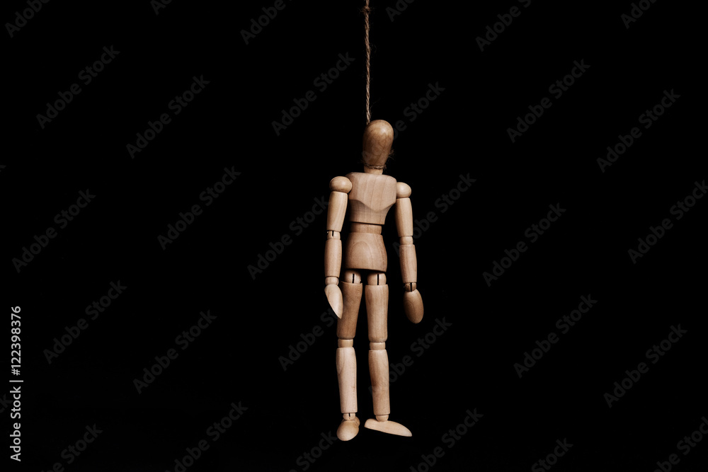 Low key, wooden marionette puppet hangman by rope, on black background  Stock Photo | Adobe Stock