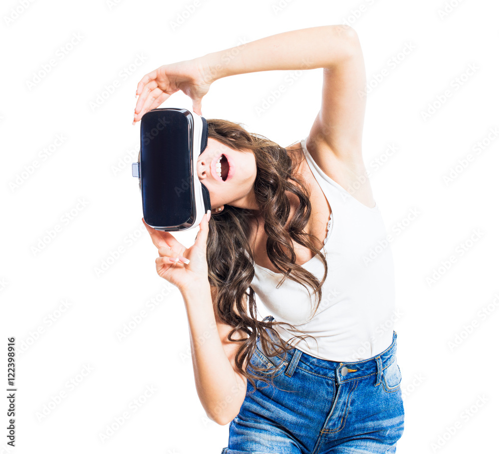 Young sexy girl with glasses of virtual reality in different poses isolated on white background. Young sexy girl with glasses of virtual reality in different poses isolated on white background.