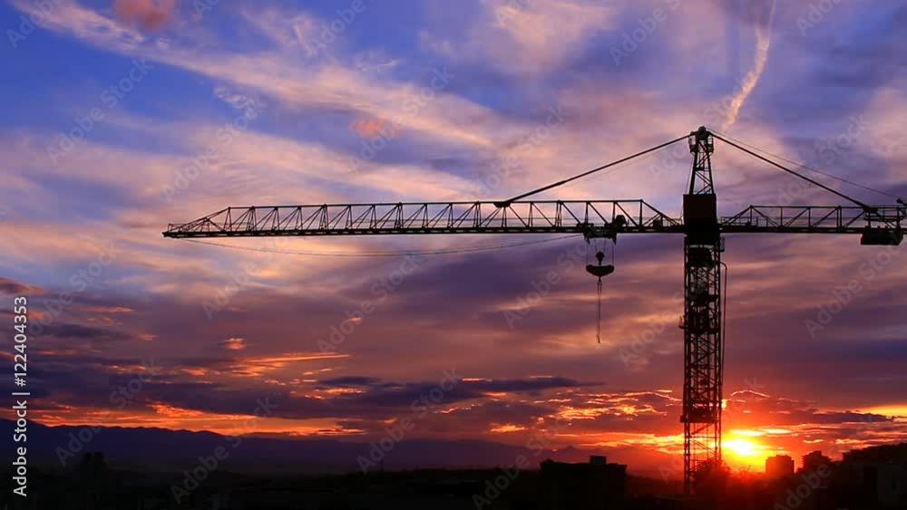 Time lapse of the crane on background of a sunset HD Time lapse of the crane on background of a sunset HD