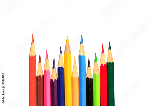 Drawing supplies: assorted color pencils on white background