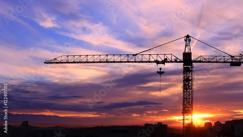 Time lapse of the crane on background of a sunset HD