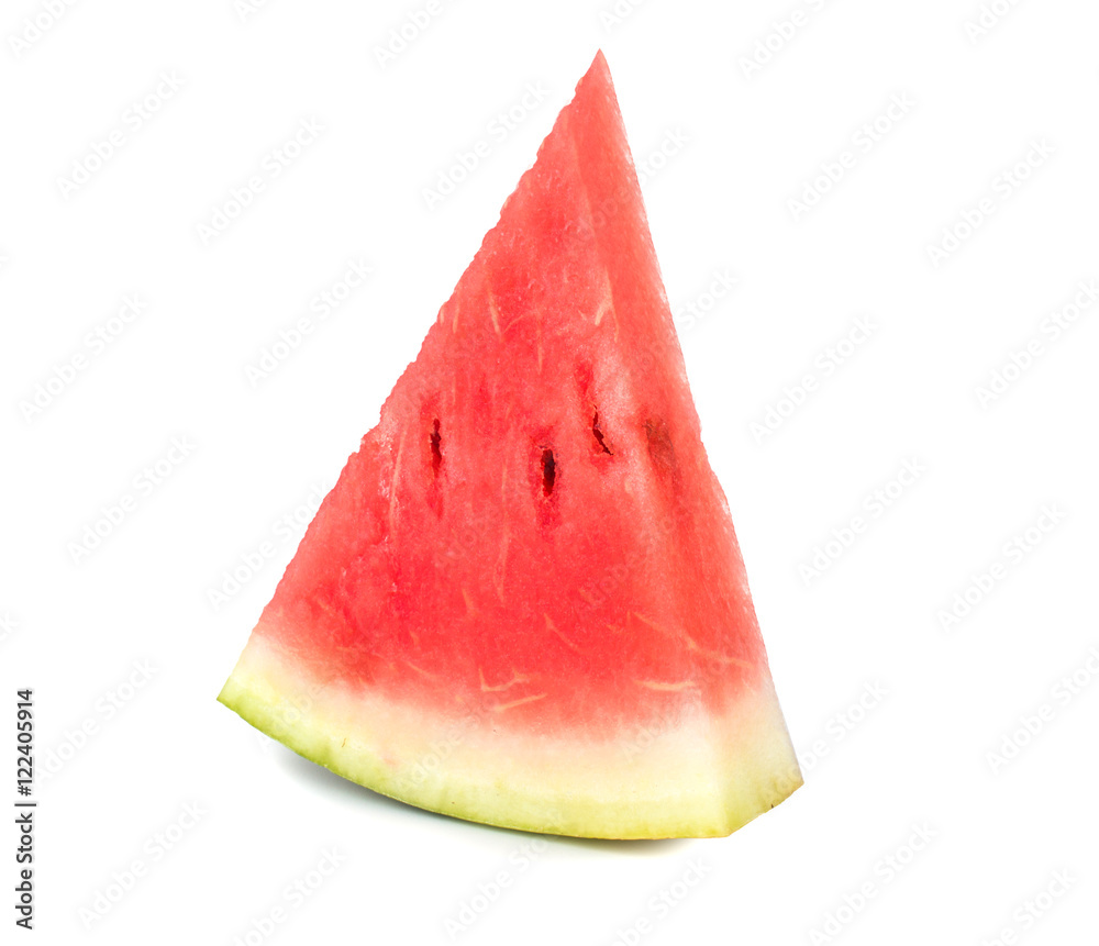The triangular piece of watermelon. Isolated on white background. The triangular piece of watermelon. Isolated on white background.