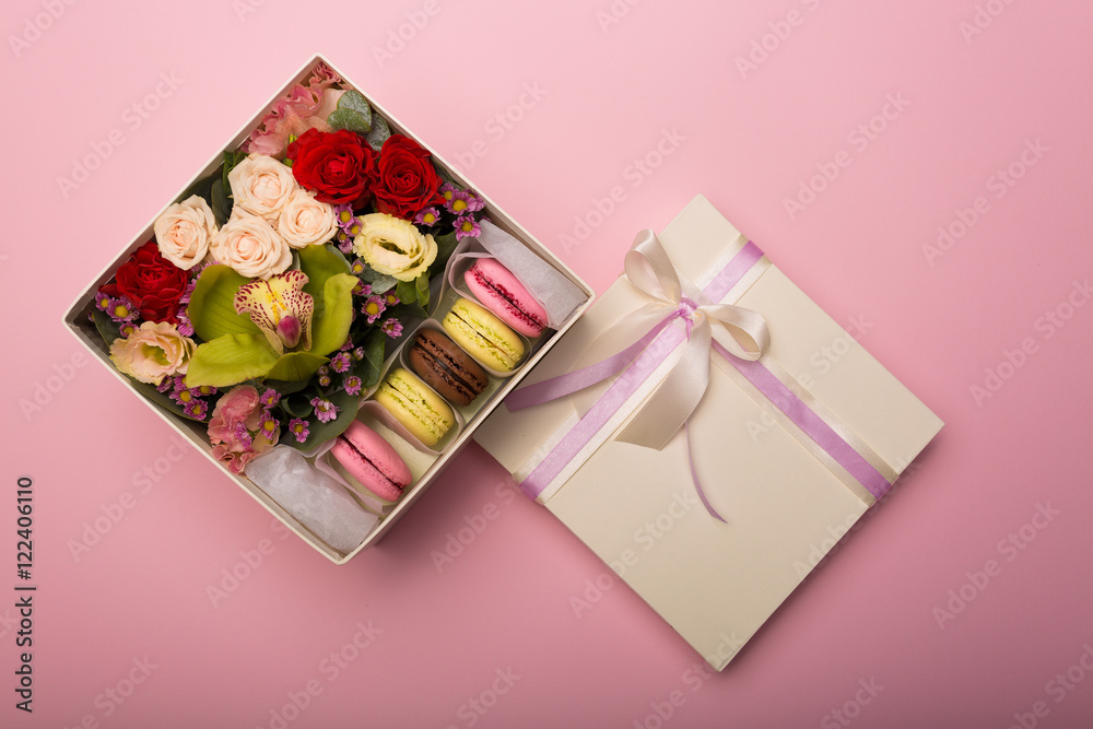 Flowers and macaroons in a hat-box Flowers and macaroons in a hat-box