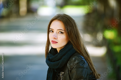 Street portrait of young beautiful woman