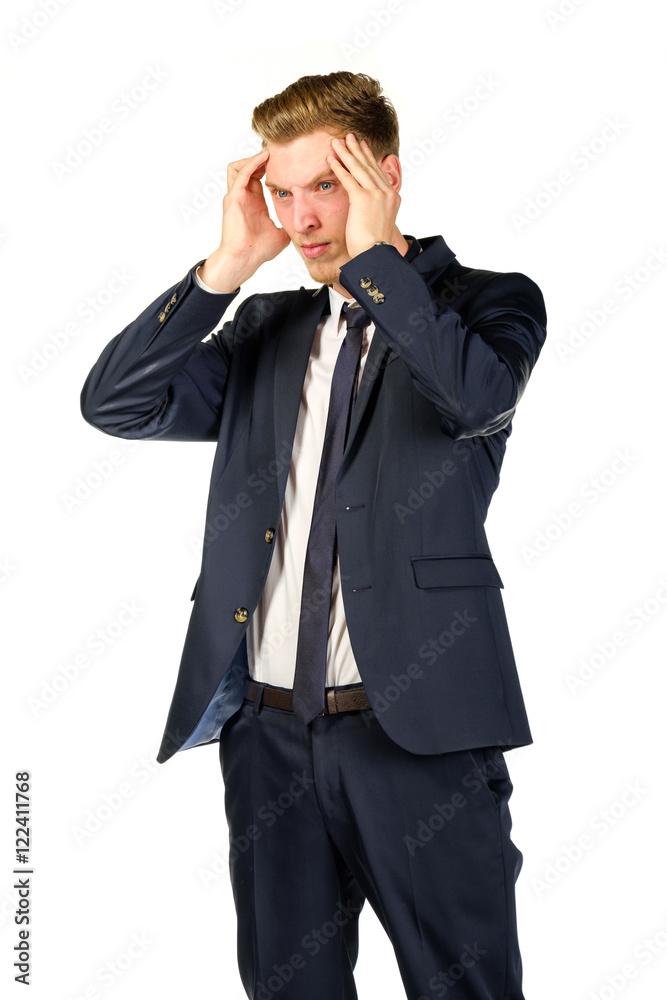 Young businessman in despair clutched his head. Crisis concept. Young businessman in despair clutched his head. Crisis concept.