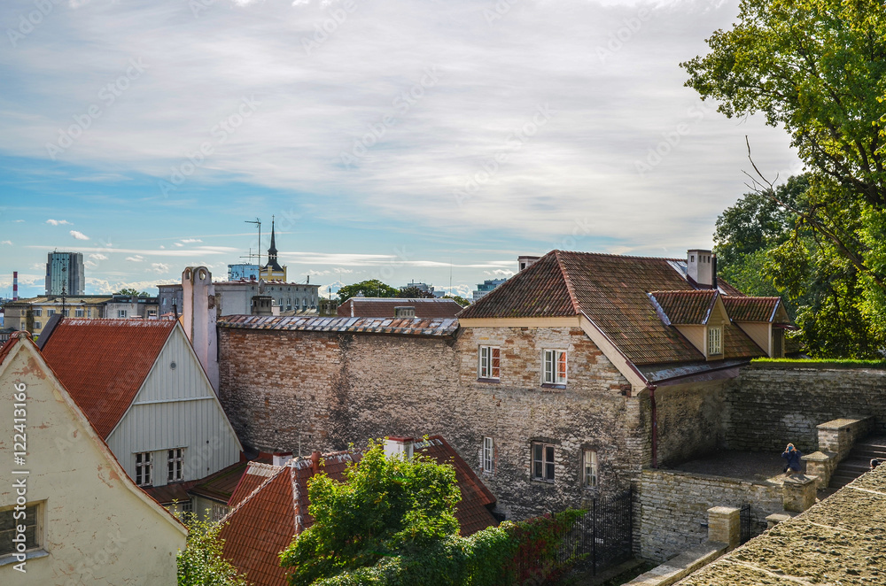 View of typical old houses in the Old Town of Tallinn, Estonia at sunny day. View of typical old houses in the Old Town of Tallinn, Estonia at sunny day.