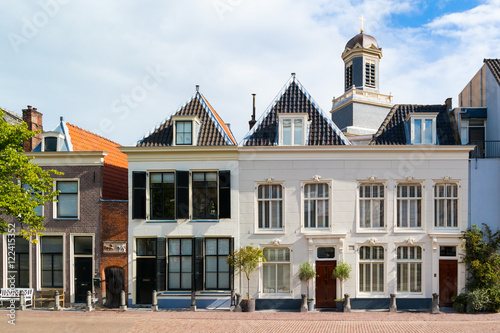 Row of historic gables of houses on Stille Rijn in old town of Leiden, South Holland, Netherlands photo
