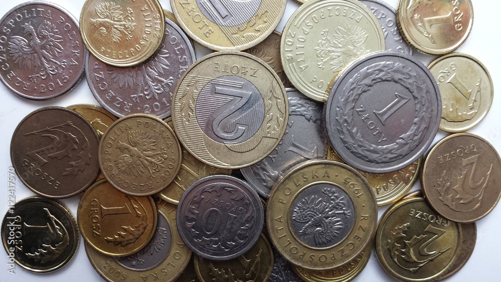 Polish coins in different denominations on a white background - zloty, PLN Polish coins in different denominations on a white background - zloty, PLN