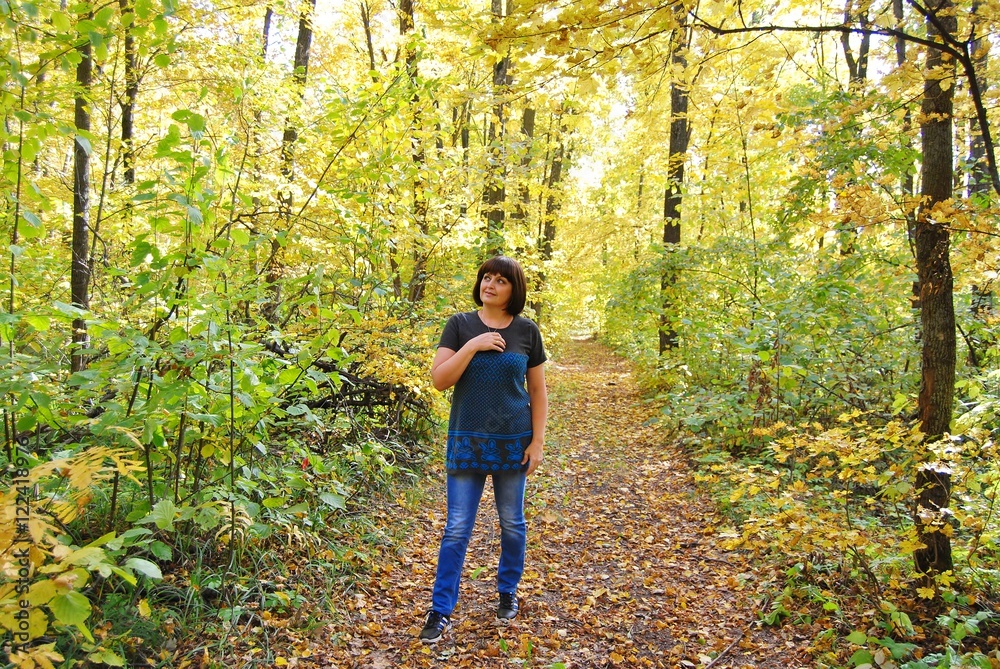 woman in autumn forest woman in autumn forest