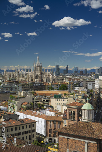Milano, 2016 panoramic skyline with clear sky and Italian Alps
